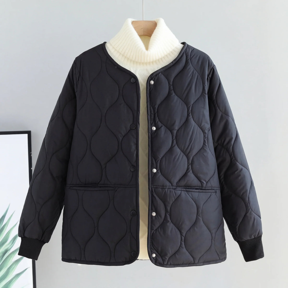 Leo cotton-padded quilted parka in black