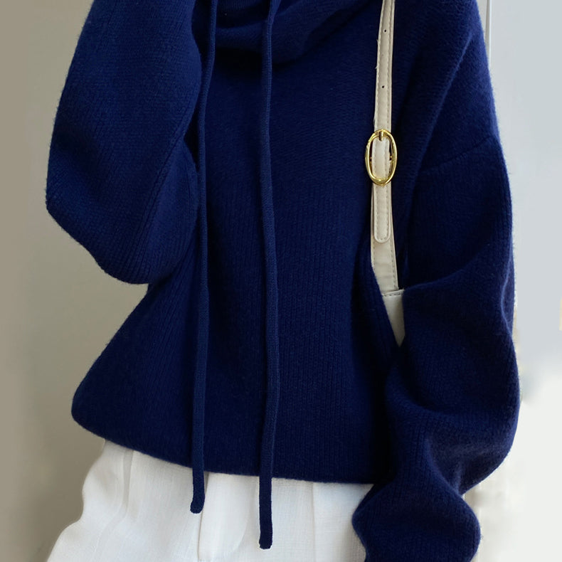 Women's green wool hooded sweater with relaxed loose fit