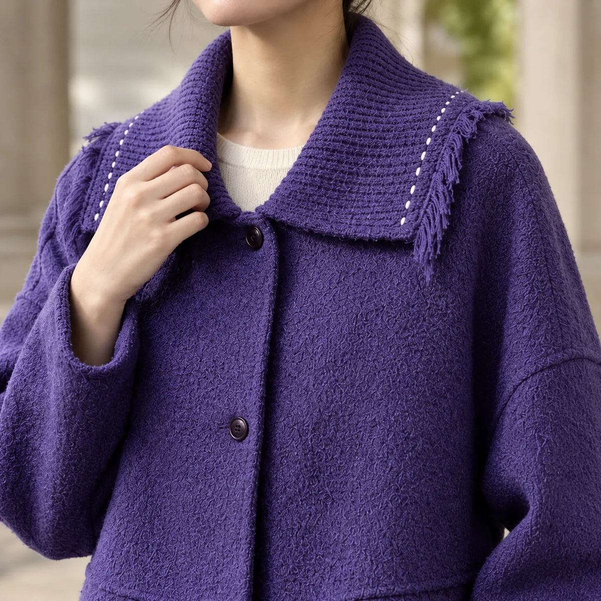 Women's purple wool jacket, close-up of fringed collar detail