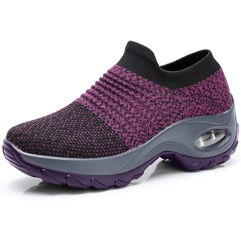 Women's black slip-on walking sneakers with grey air cushion sole