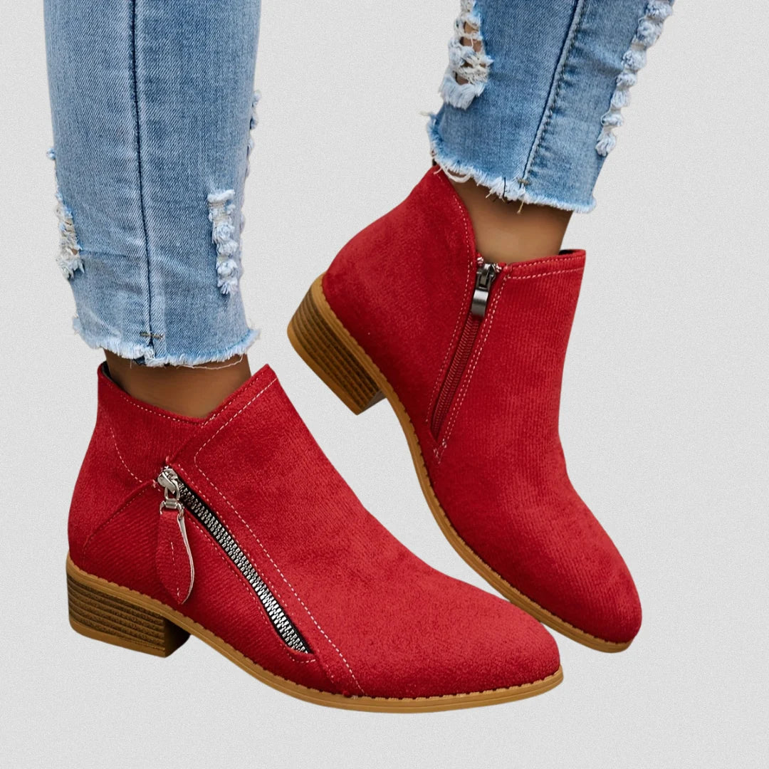 Women's black ankle boots, styled front view