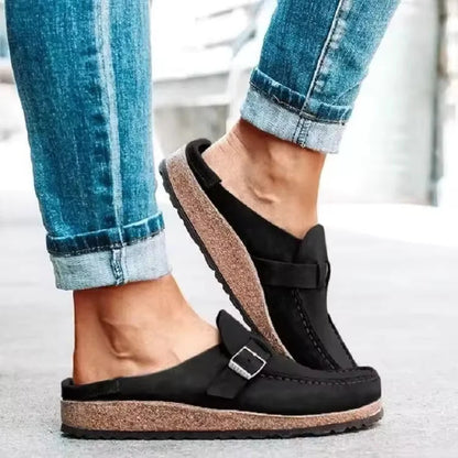 Women's slip-on mules with buckle strap