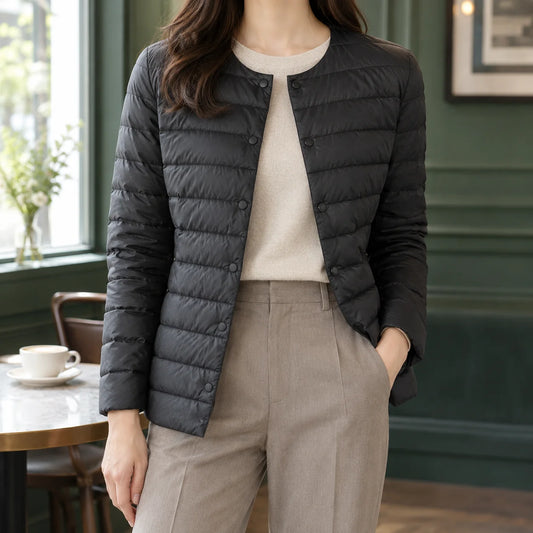 Women's black quilted jacket with horizontal baffles