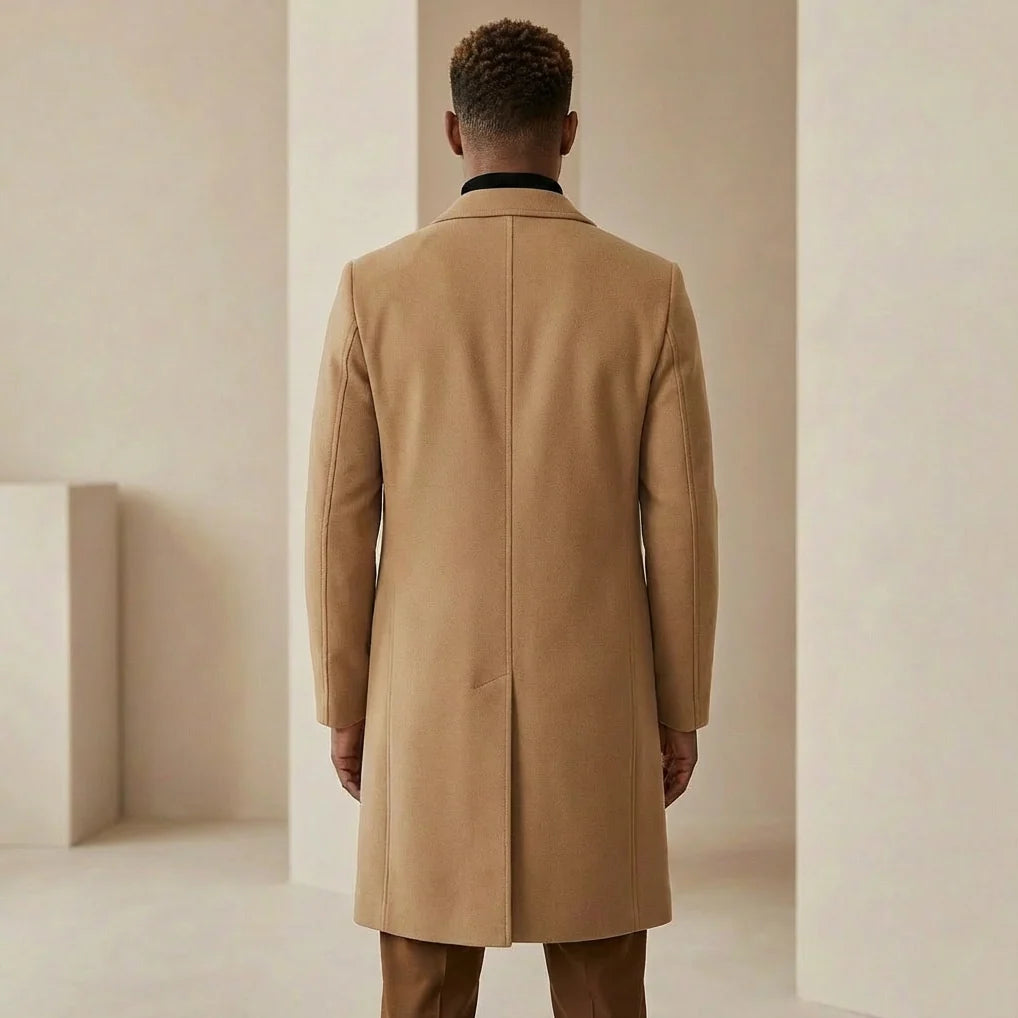 Women's black tailored overcoat, back vent detail