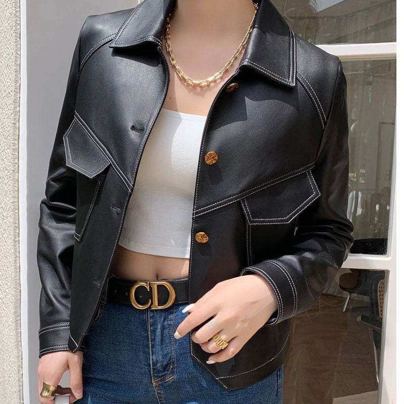 Women's brown cropped faux leather jacket with oversized fit