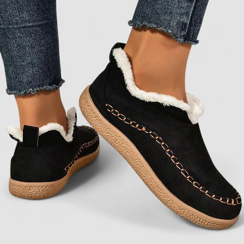 Women's black side-zip ankle boots with wide toe box