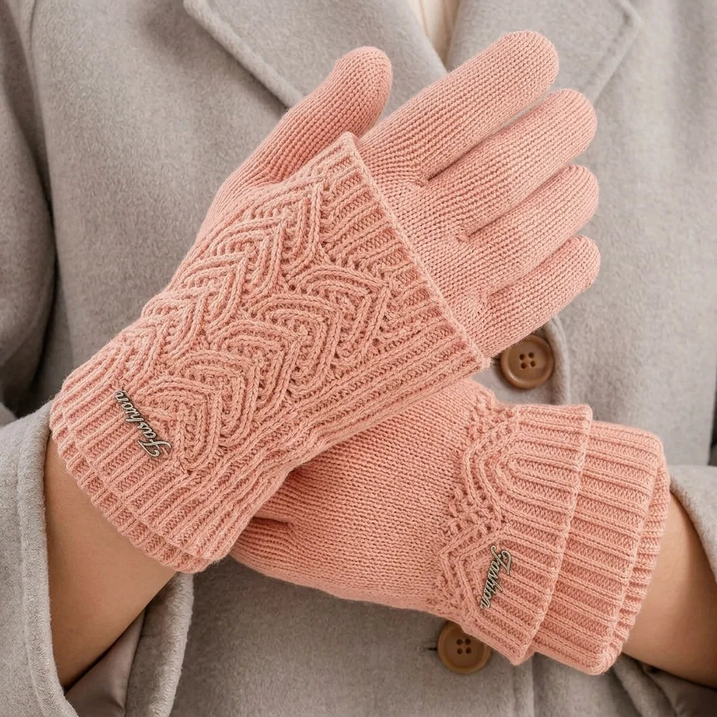 Women's peach touchscreen knit gloves with heart cable pattern
