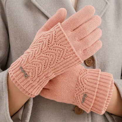 Women's peach touchscreen knit gloves with heart cable pattern