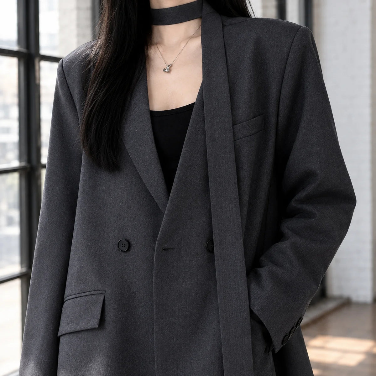 Women's black longline blazer, structured shoulders