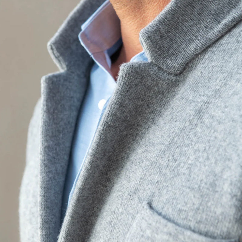 Men's blue knit cardigan jacket with two button front