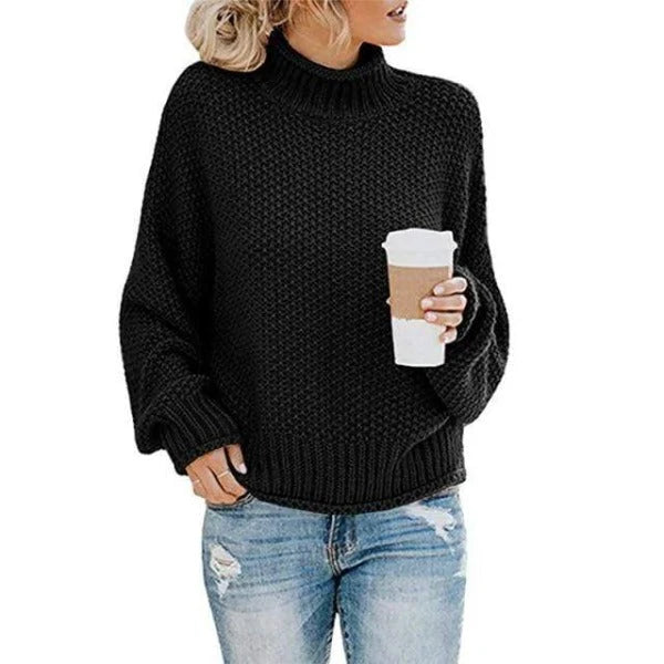 Women's black turtleneck sweater with relaxed knit design
