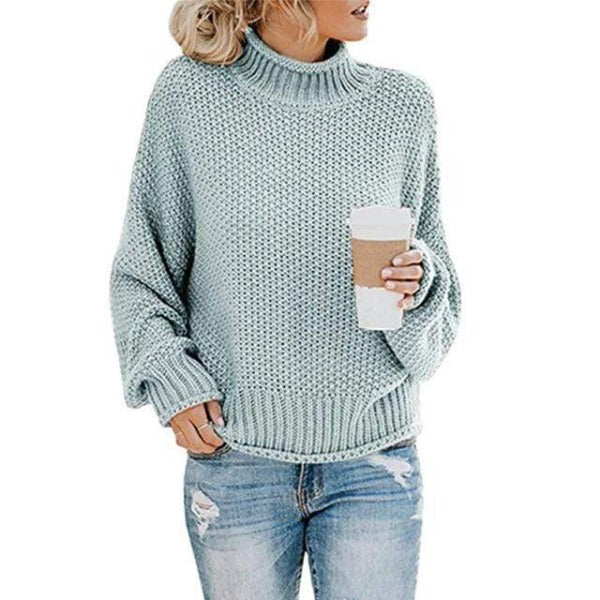 Women's light blue turtleneck sweater with relaxed knit design
