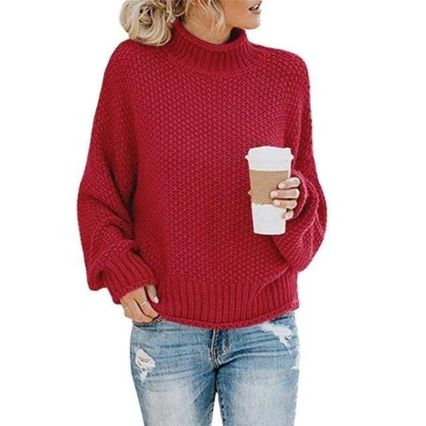 Women's burgundy turtleneck sweater with relaxed knit design