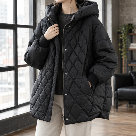 Women's black oversized puffer jacket with duck-down fill