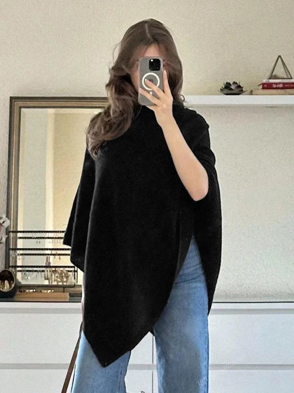 Daisy knit cape worn, lifestyle shot