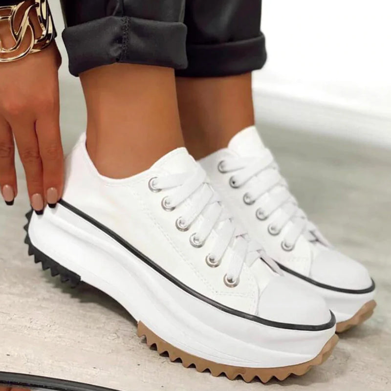 Women's white platform canvas sneakers with lace up front