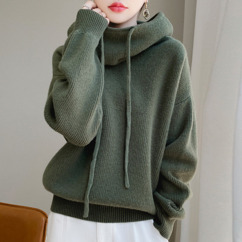 Women's green wool hooded sweater with relaxed loose fit