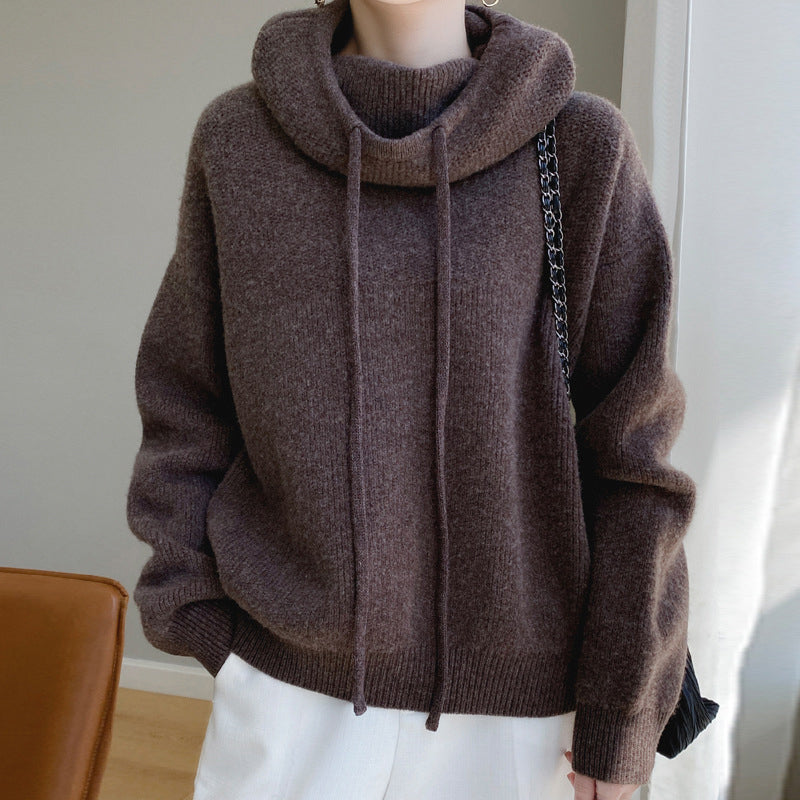 Women's green wool hooded sweater with relaxed loose fit