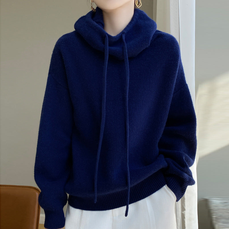 Women's green wool hooded sweater with relaxed loose fit