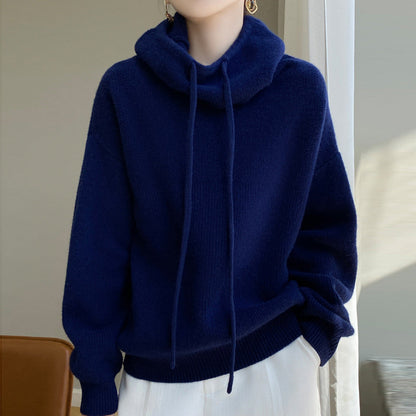 Women's green wool hooded sweater with relaxed loose fit