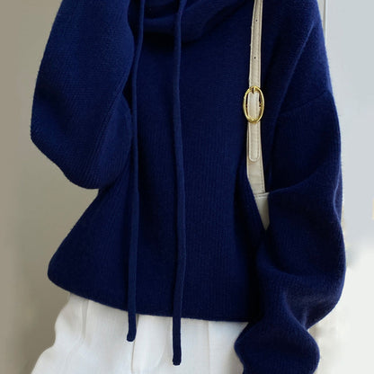 Women's green wool hooded sweater with relaxed loose fit