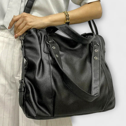 Women's brown vegan leather shoulder bag with crossbody strap