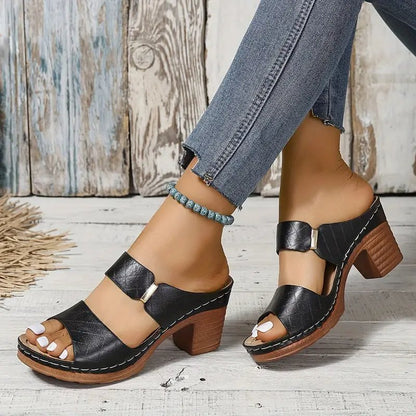 Women's black cushioned block heel sandals with woven open toe