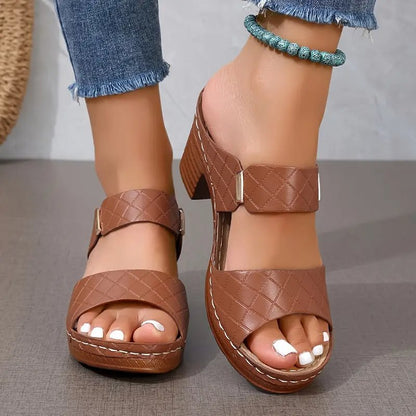 Women's black cushioned block heel sandals with woven open toe