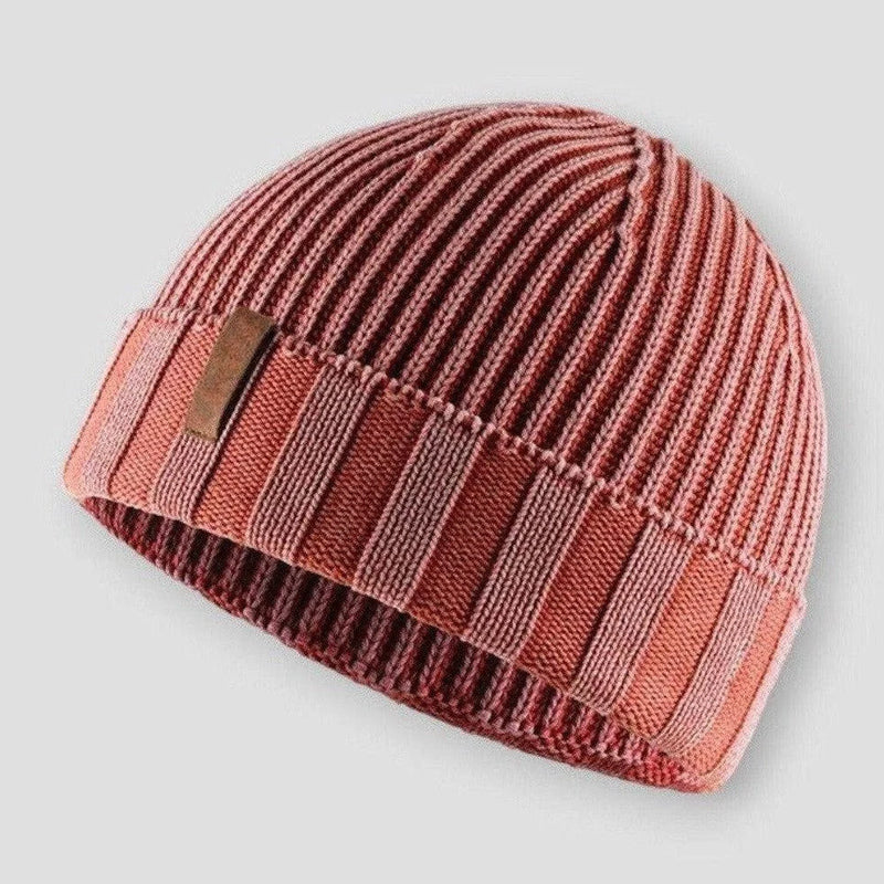 Orange knit beanie hat with vintage inspired distressed finish