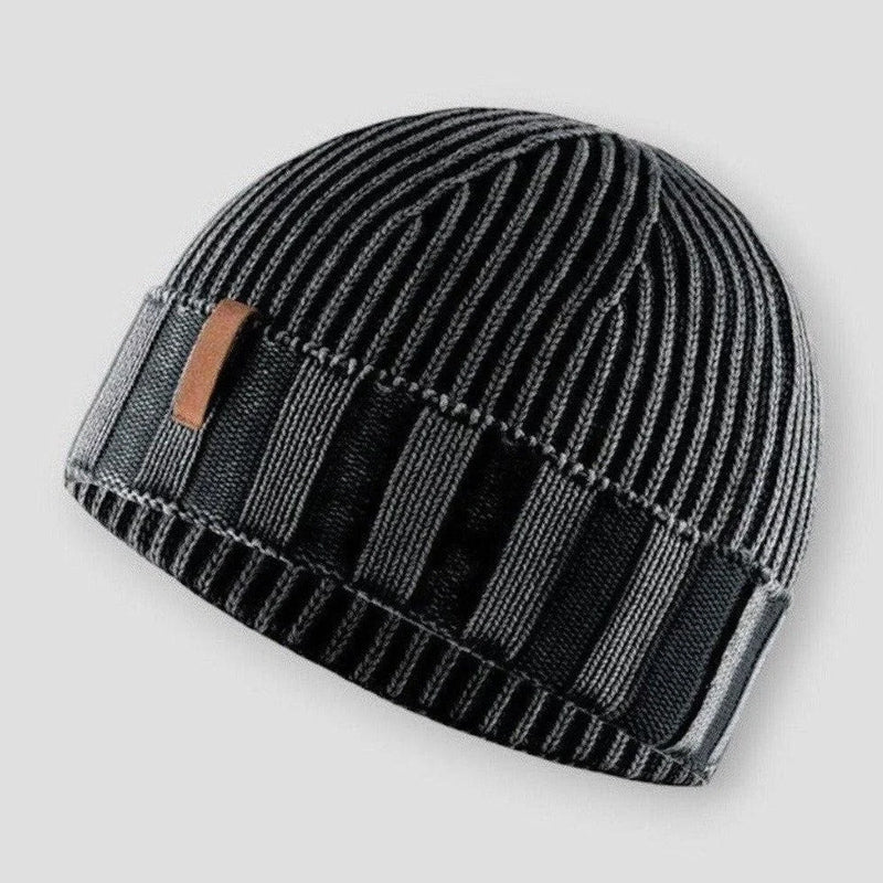 Black knit beanie hat with vintage inspired distressed finish
