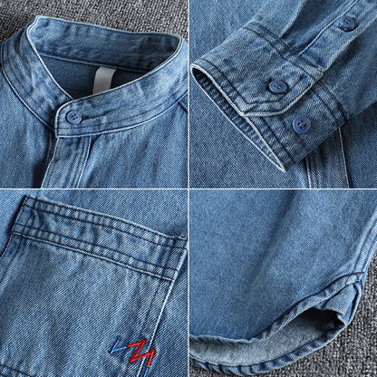 Men's light blue washed denim shirt with chest pockets and long sleeves