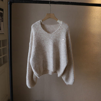 Women's beige deep v neck knit pullover sweater with soft drape