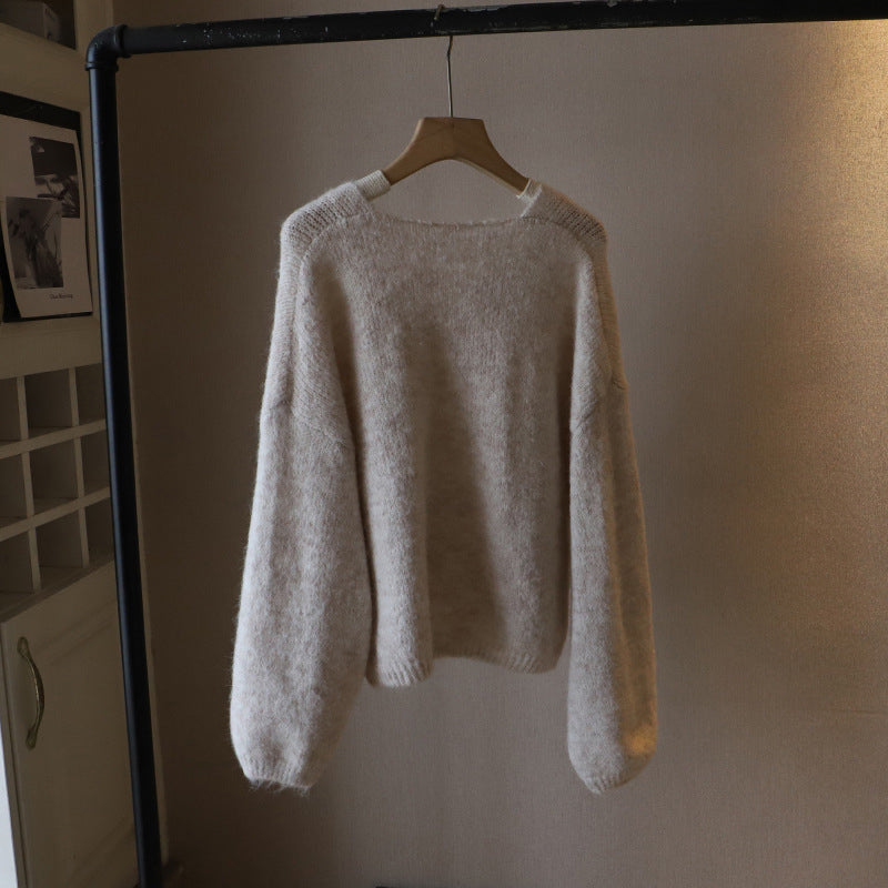 Women's beige deep v neck knit pullover sweater with soft drape