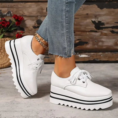 Women's beige lace-up platform oxford shoes with striped wedge sole