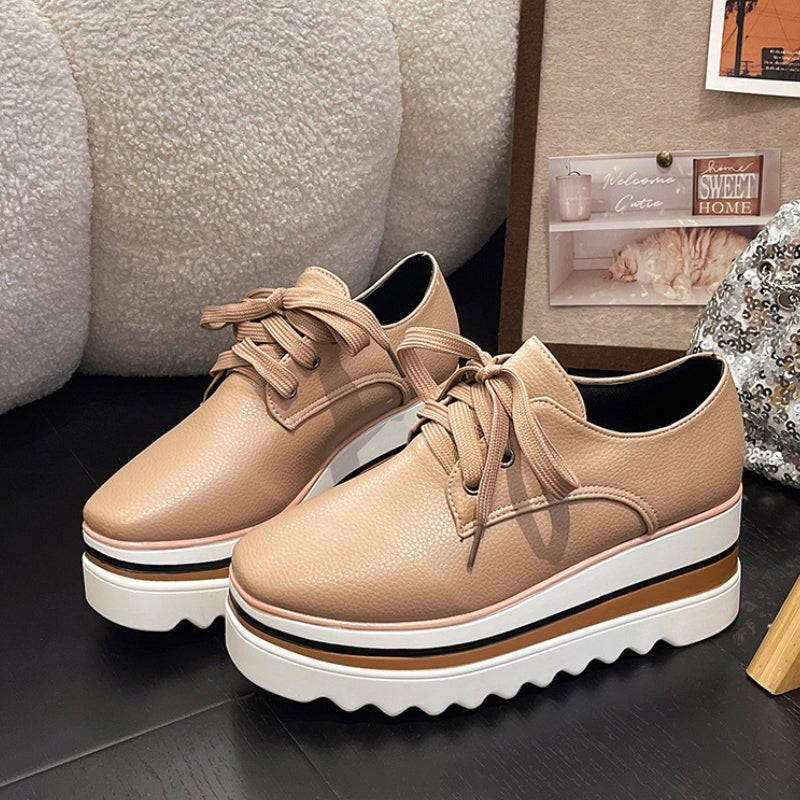 Women's beige lace-up platform oxford shoes with striped wedge sole