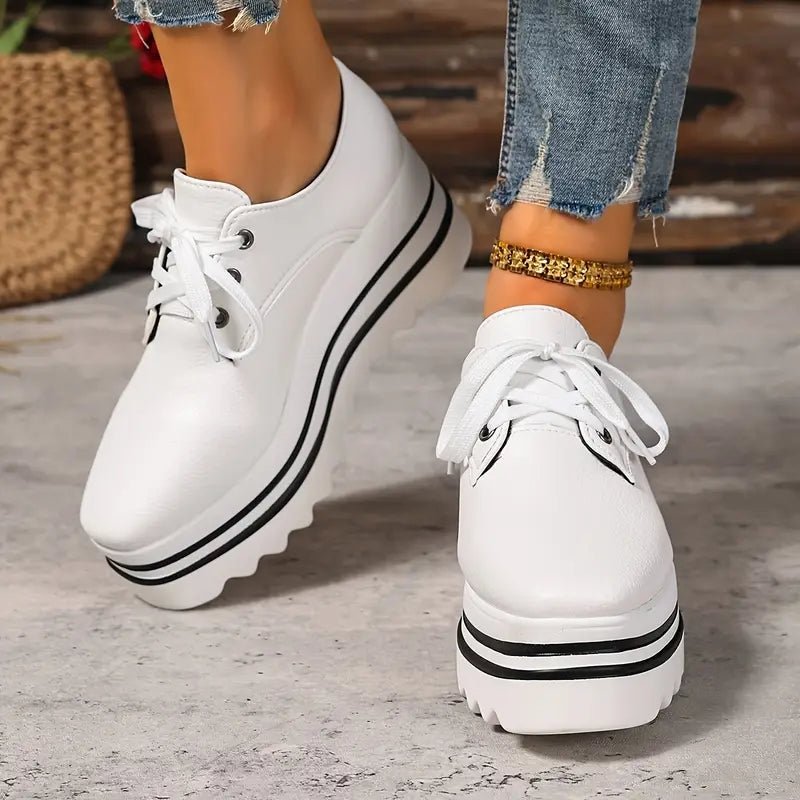Women's beige lace-up platform oxford shoes with striped wedge sole
