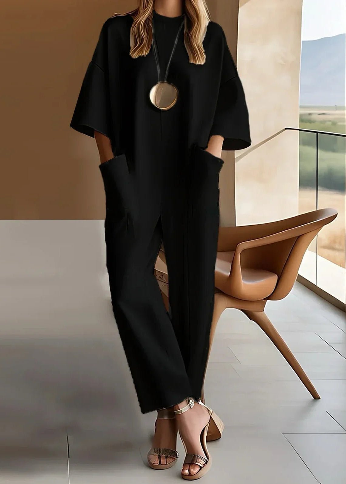 Women's white wide leg jumpsuit with crew neck and pockets