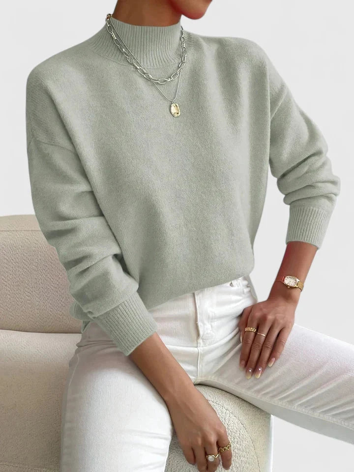 Women's light green turtleneck sweater