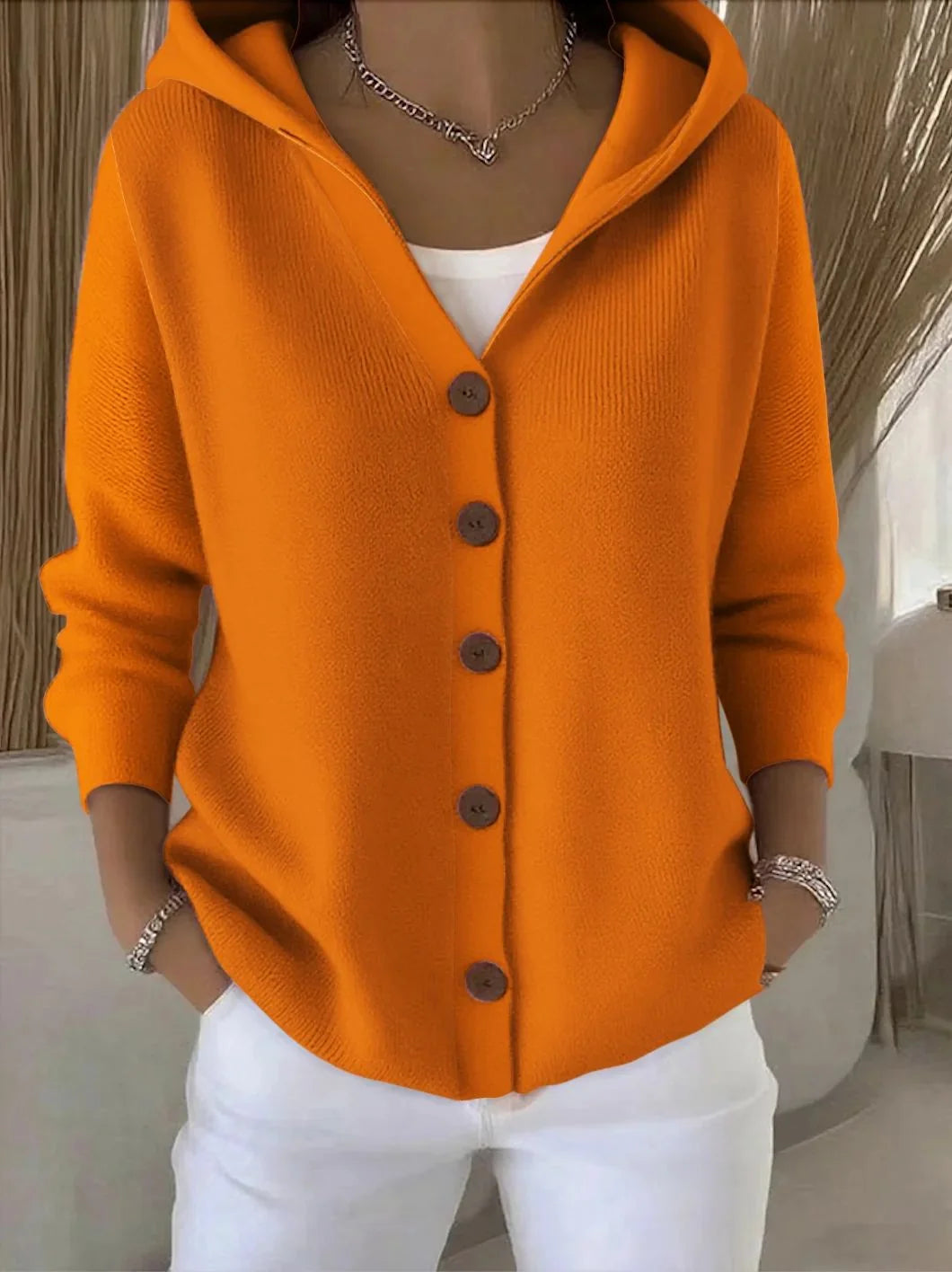 Women's orange hooded cardigan with button front