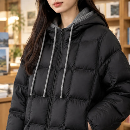 Women's white puffer jacket with adjustable drawcord hem