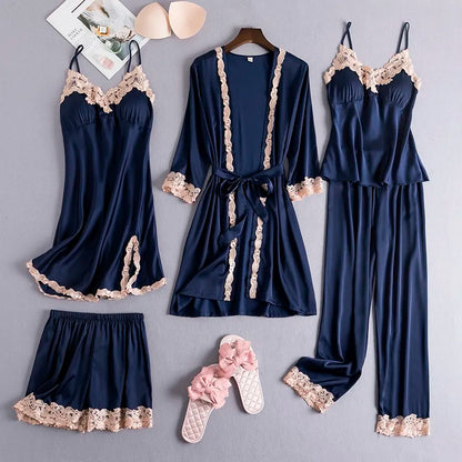 Women's navy satin pajama set with lace trim and robe