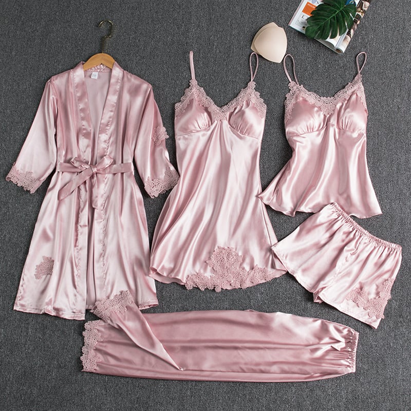 Women's pink satin pajama set with lace trim and robe