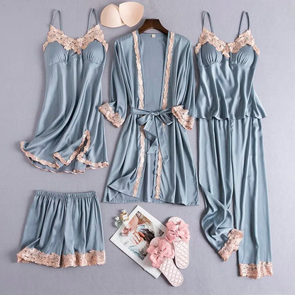 Women's dusty blue satin pajama set with lace trim and robe