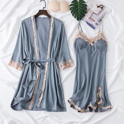 Women's satin pajama set with lace trim and robe