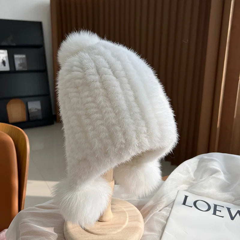Women's white plush winter hat with pom poms