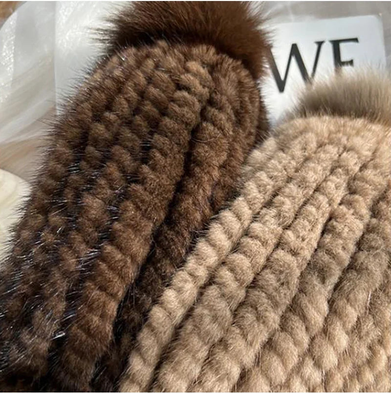 Women's plush winter hat with pom poms
