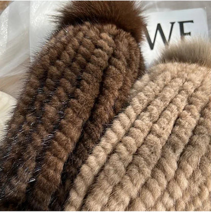 Women's plush winter hat with pom poms