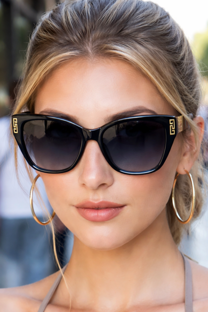Women's blue cat eye sunglasses with gold detail