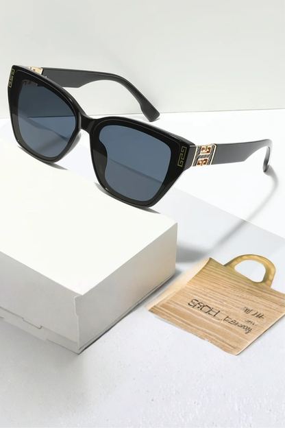 Women's light purple cat eye sunglasses with gold detail