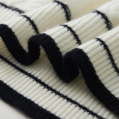Cashmere cable knit sweater with striped collar
